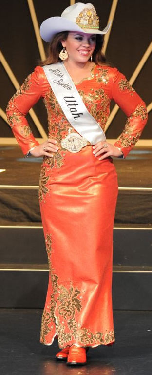 Brandi Mortensen, Miss Rodeo Utah, wearing ared golden nuevo leather dress