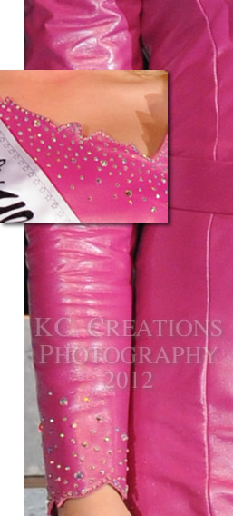 Close-up of Laura Taysom's fuchsia leather dress