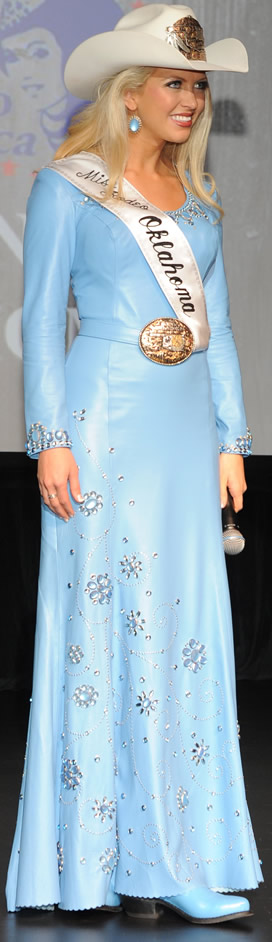 Lauren Heaton, Miss Rodeo America 2015 in a light blue lambskin dress designed by Jan Faulkner