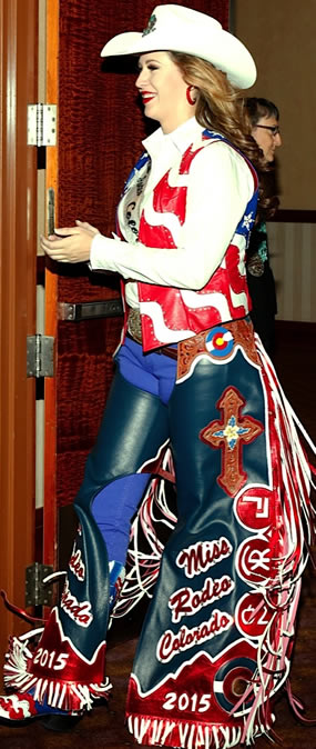 Miss Rodeo Colorado wearing a flag-themed lambskin leather vest