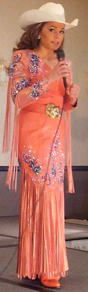 Talia Wilson in tropical nuevo lambskin dress